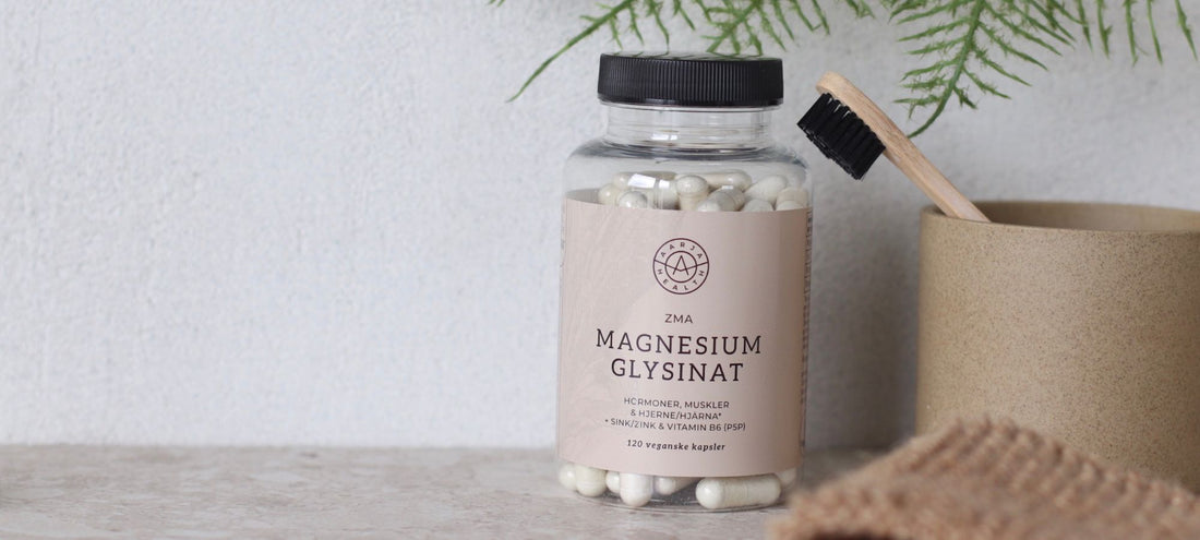 ZMA magnesium glysinat i vegetabilske kapsler på baderomsbenk med tannbørste i bambus